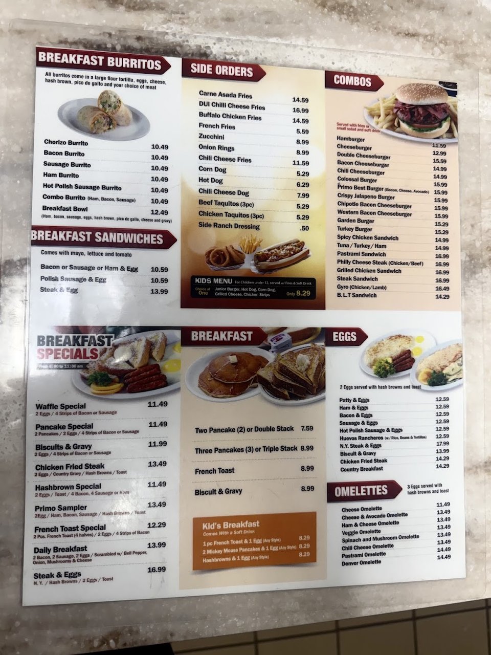 Plates of burgers, fries, and salad options.